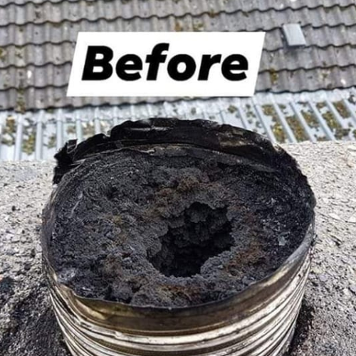 Before chimney cleaning showing heavily sooted and dirty chimney pot on tiled roof